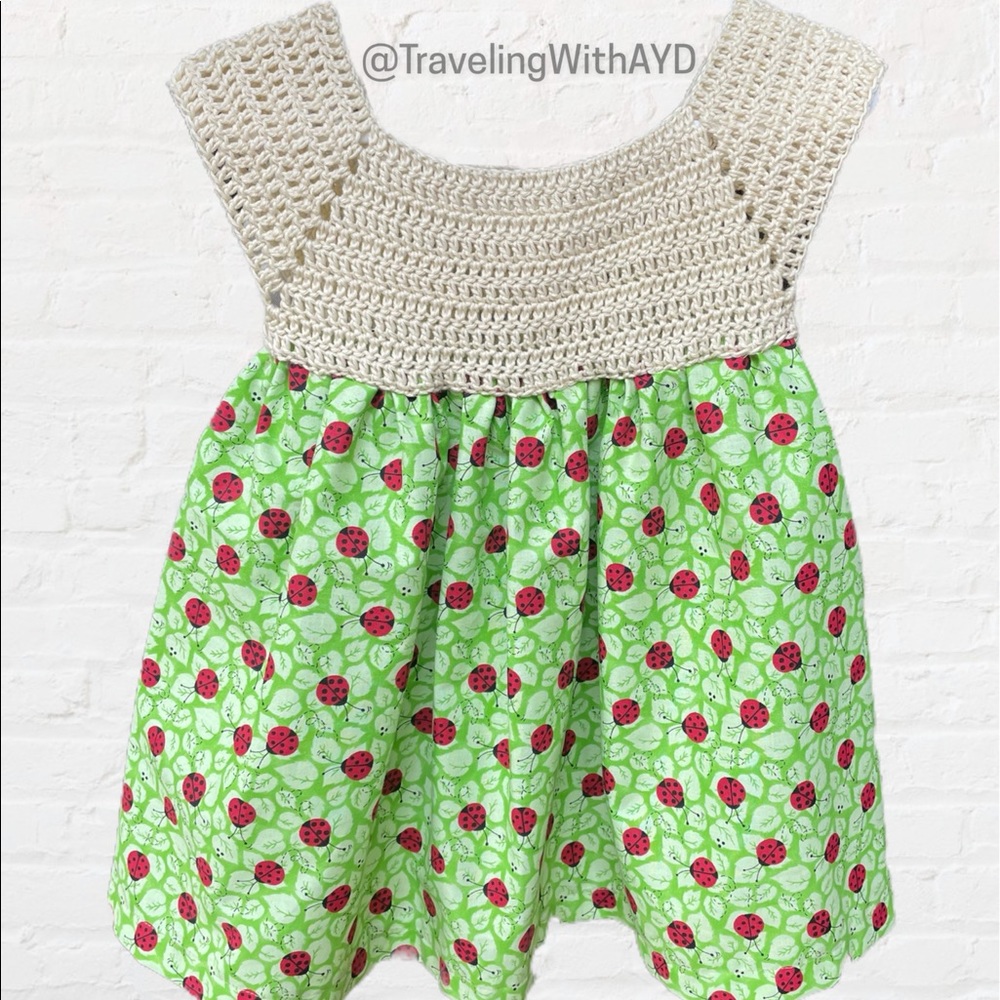 Hand Crocheted baby girl dress with ladybugs